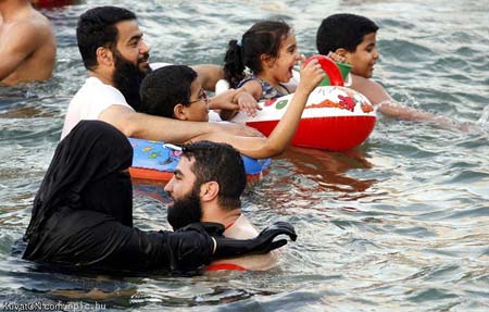 Click image for larger version

Name:	muslim_swimming.jpg
Views:	171
Size:	30.1 KB
ID:	245422